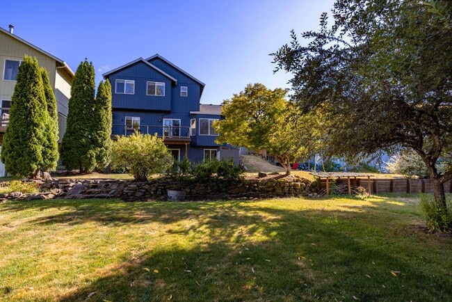 Building Photo - 4 Bedroom house in Hazel Dell - AC, large ...