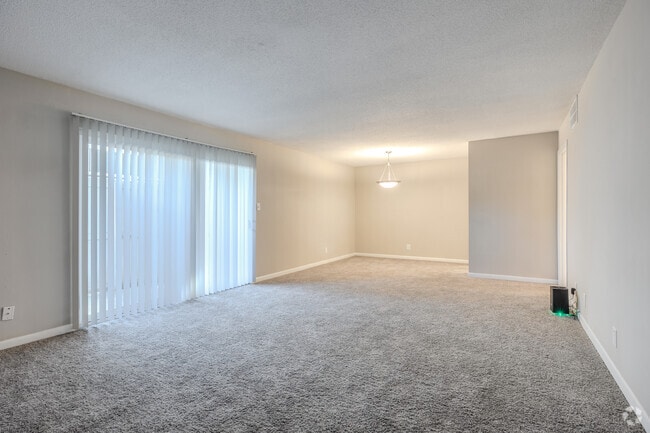 3BR, 2BA - 1,260SF - Living Room - The Park at Northside