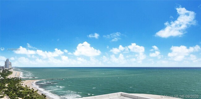 Building Photo - 10155 Collins Ave