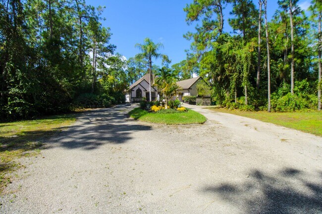 Building Photo - ** GOLDEN GATE ESTATES ** SINGLE FAMILY HOME ** NO HOA SO MOVE IN FAST ** 3 BR\2 BATH PRIVATE HEA...