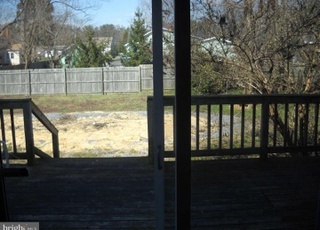 sliding glass doors take you out to your back deck - 413 Riverview Rd