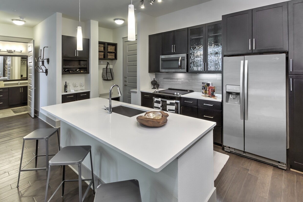 Expansive kitchen island in select homes. - Windsor Fitzhugh