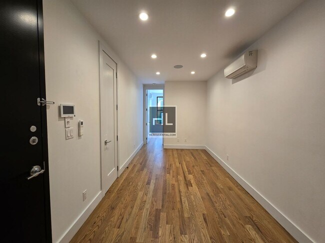 Building Photo - Brand New 1BR - No Fee - Pet-Friendly - Up...