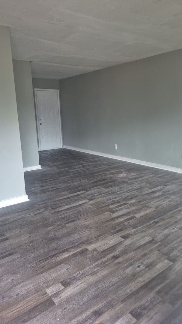 Building Photo - Cozy Home with Updated Flooring and Bright Rooms