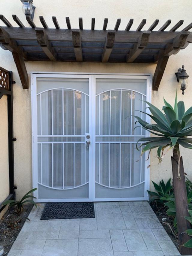 French door entry with security screen door. - 13405 Burbank Blvd