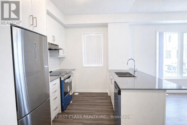 Photo du bâtiment - 151 Honeycrisp Cres