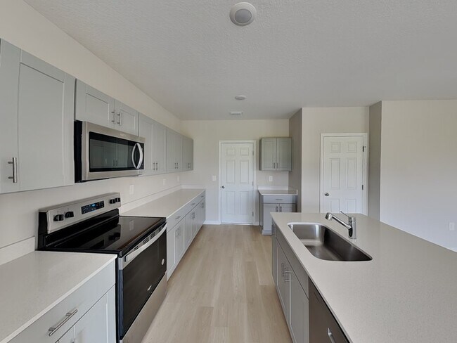 Building Photo - 4075 Gardenia Ave