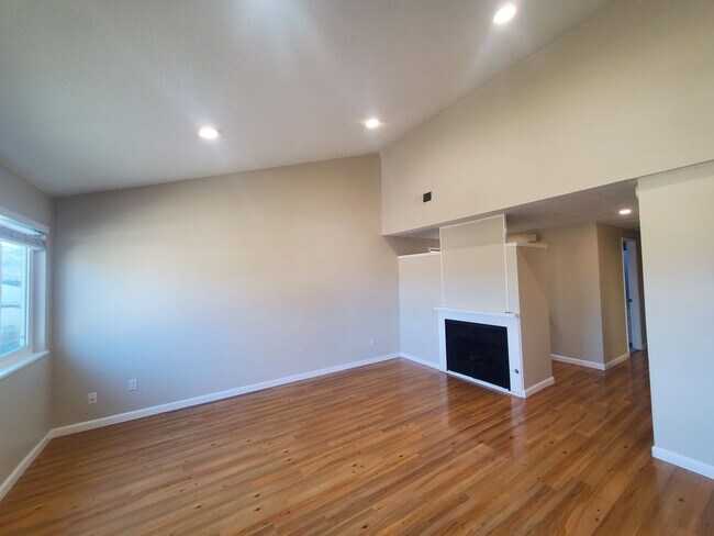 Building Photo - Private 2x2 Santa Rosa Townhouse with pool, 2-car garage, workshop area, fireplace, W/D Hookups