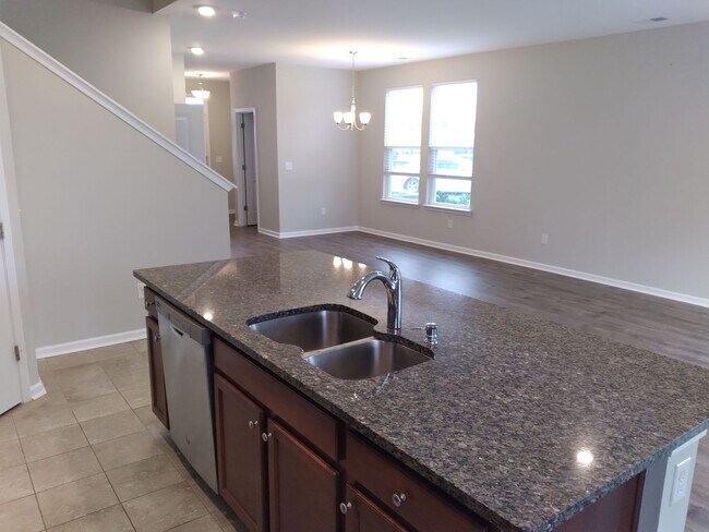 Building Photo - ONE MONTH FREE with a sixteen-month lease. NEW PAINT! 3 Bedroom Town Home With Garage at Bridgewa...