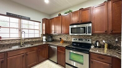 Building Photo - 4702 Cohune Palm Ct