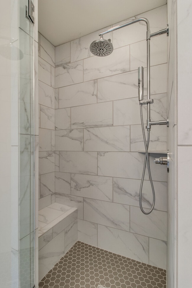 Large custom tile shower with rainfall and hand held shower heads - 707 Vernon Ave