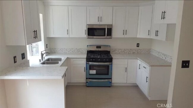 Building Photo - 8624 De Soto Ave