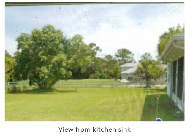 kitchen view over sink - 15228 73rd Ter N