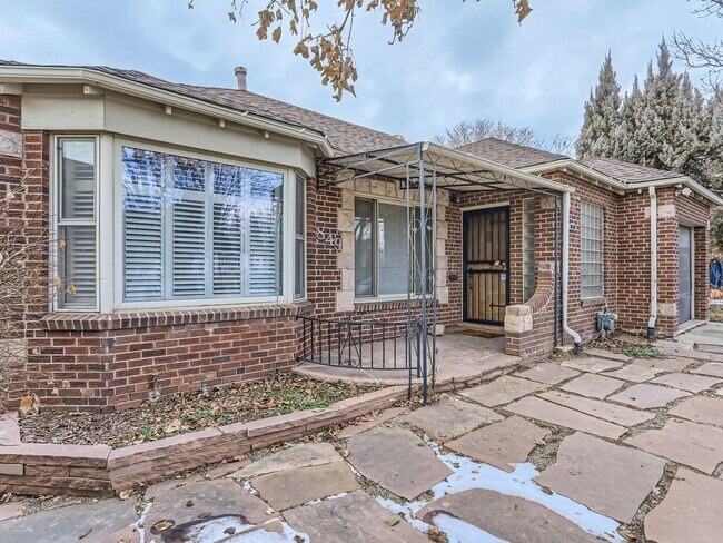Building Photo - Evolve Real Estate: Available 8/8/26 Brick Tudor with Large Yard and Finished Basement!