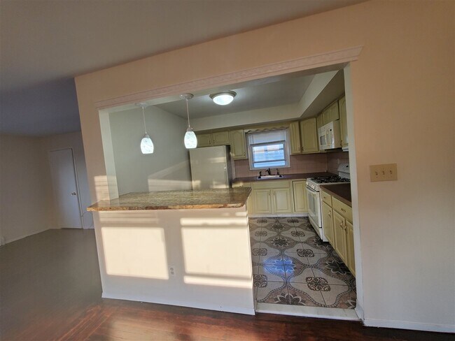 Building Photo - 3415 Givernaud Terrace