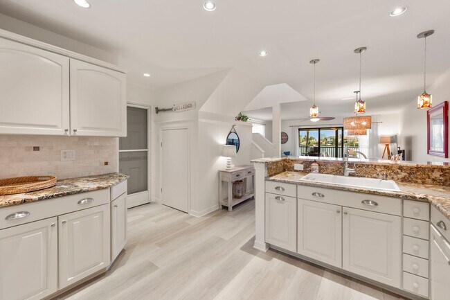 Building Photo - Steps from the Sand! Seasonal Retreat in Palm Bay Estates