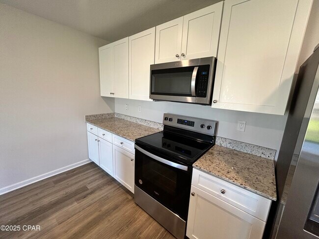 Foto del edificio - 5129 Rivergrass Dr