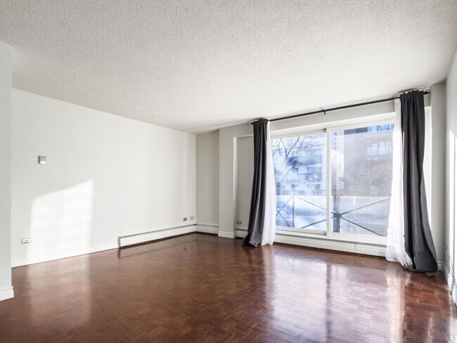 Building Photo - 120-124 24 Ave SW