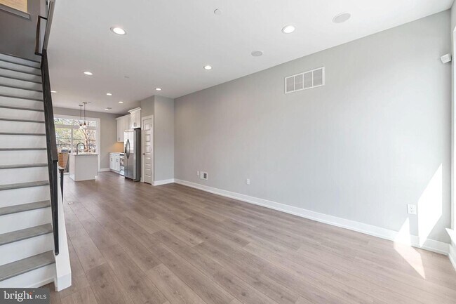 Building Photo - Brand New 4-Bedroom Luxury Home with Rooft...