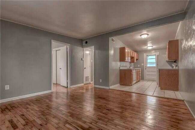 From living room towards rooms and kitchen - 2910 W 44th Ave