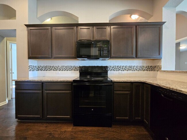Building Photo - RENT REDUCTION - AVAILABLE NOW!