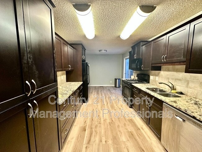 Building Photo - 10423-10440 40 Ave NW