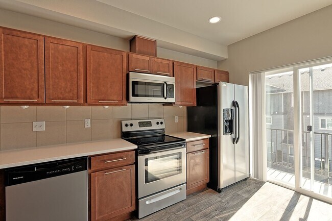 Building Photo - Available Now | Spacious 3BR Northlake Court Townhome with Garage & Private Balcony