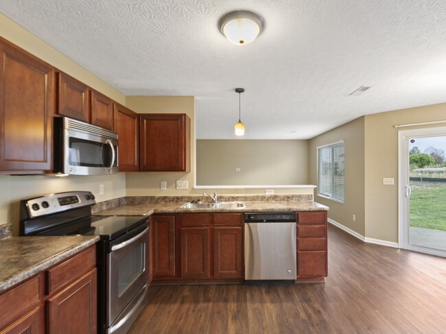Building Photo - 5877 Hayden Dr