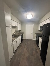 Kitchen and 2nd Exit Door - FLEETWOOD APARTMENTS