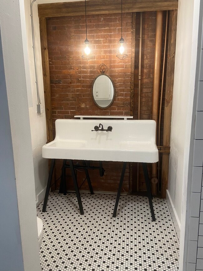 Restored cast iron bathroom sink - 616 W Azeele St
