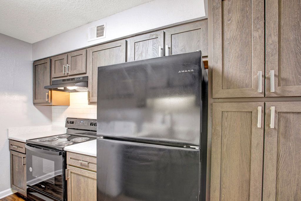 Cocina - Pinewood at National Hills Apartments