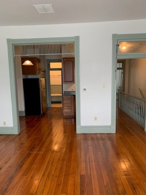 Living Room into kitchen - 205 W 4th St