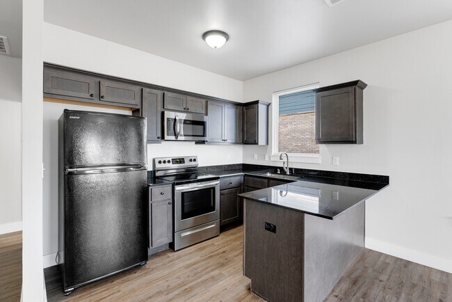 Building Photo - 3022 E 4th Ave