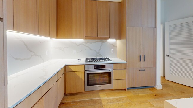 Building Photo - Stunning Fully Furnished Capitol Hill One Bedroom W/Parking Included!