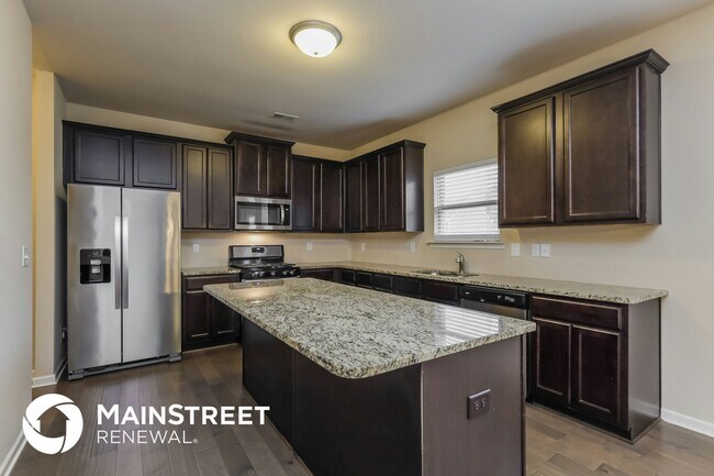 Foto del edificio - 1209 Creek Crossing Dr