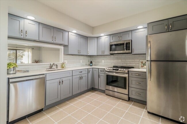 Tile floor and lots of cabinets - 20 Raymond Plz