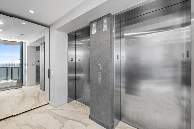 Building Photo - 18555 Collins Ave