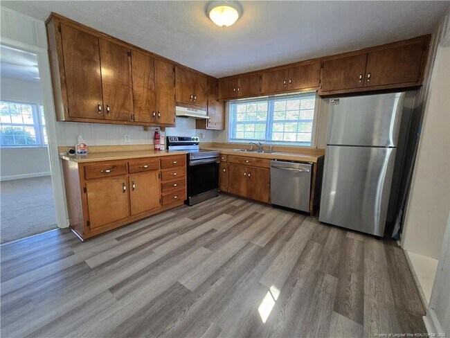 Building Photo - 6505 Elkins Dr