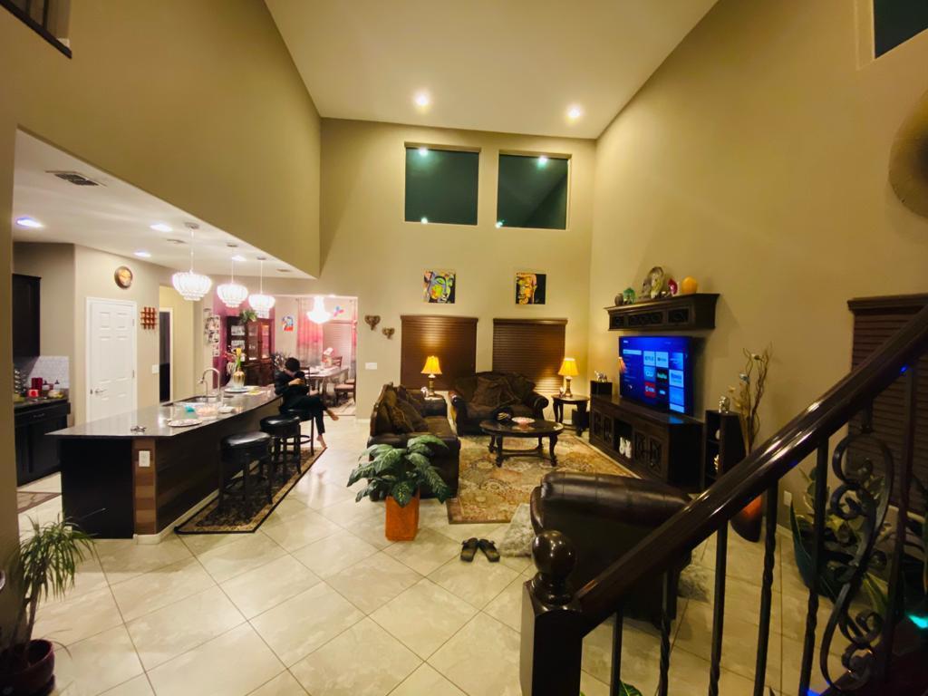 Living, Kitchen, and Dinning view from Stairs - 2627 W Gray Wolf Trl