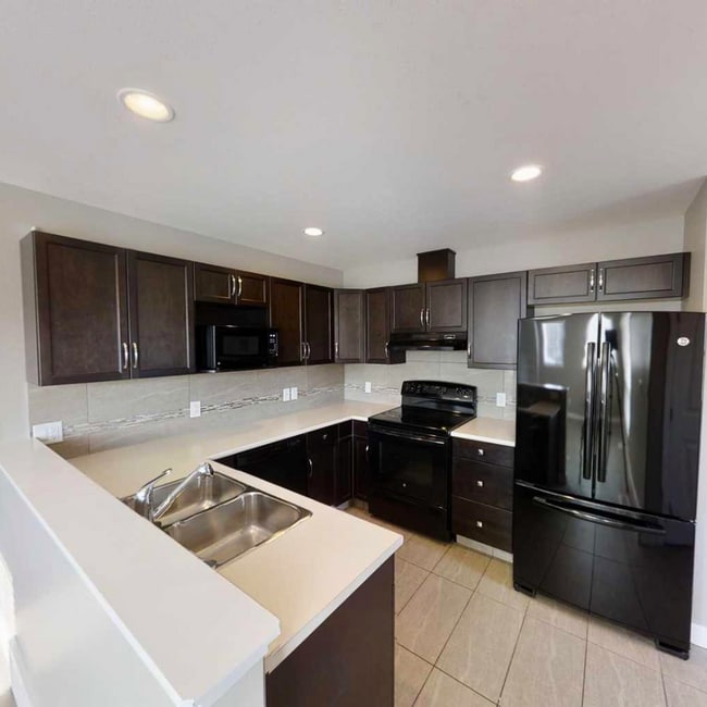 Building Photo - 8829-8896 96 Ave
