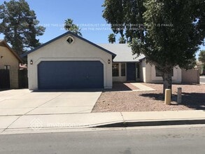 Building Photo - 8833 W Windsor Ave