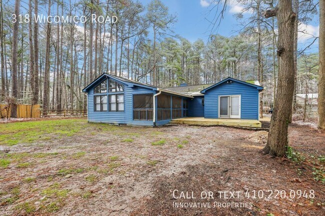 Building Photo - Walk to fishing, crabbing and more! Commun...