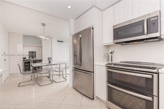 Building Photo - 5555 Collins Ave