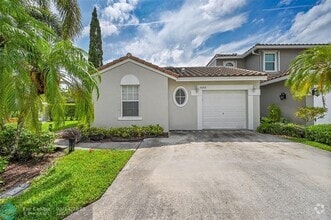 Building Photo - 5642 NW 118th Dr