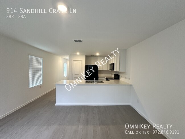 Foto del edificio - 914 Sandhill Crane Ln