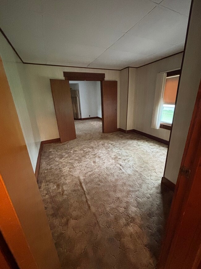 Dining room- previously used as a main floor bedroom - 590 S Henderson St