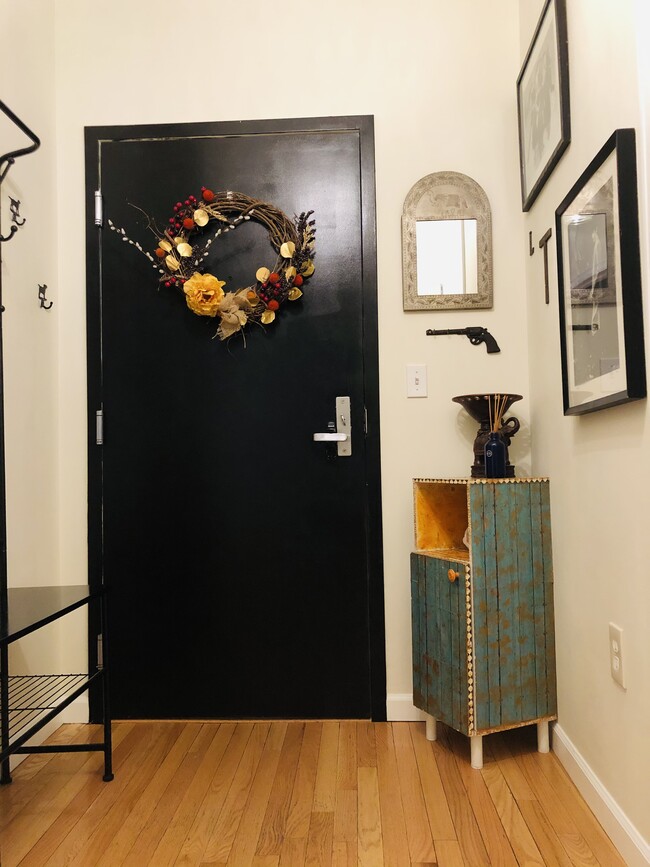 Inviting Entry with built-in coat rack and large coat closet - 1950 N Logan St