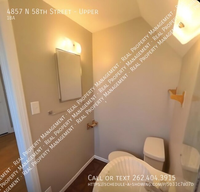 Building Photo - One Bedroom Upper