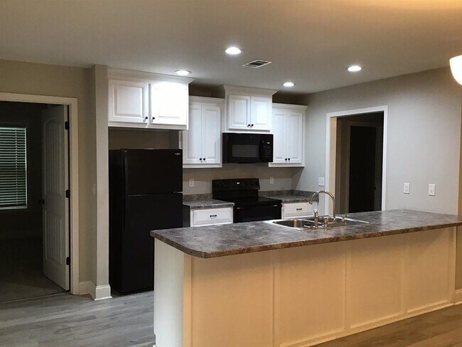 Building Photo - 703 Tallulah Trl