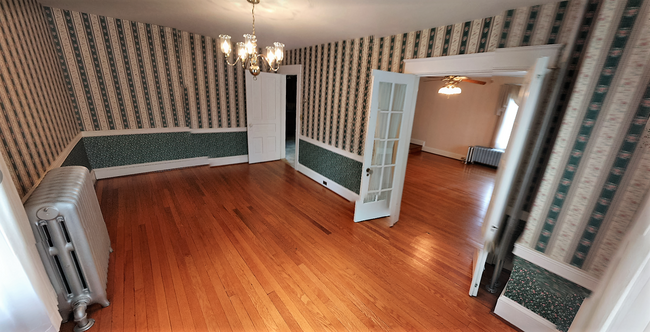 Dining room. NOTE: all pictures were taken before the interior was repainted - none of the old wall paper remains. - 925 North Market Street